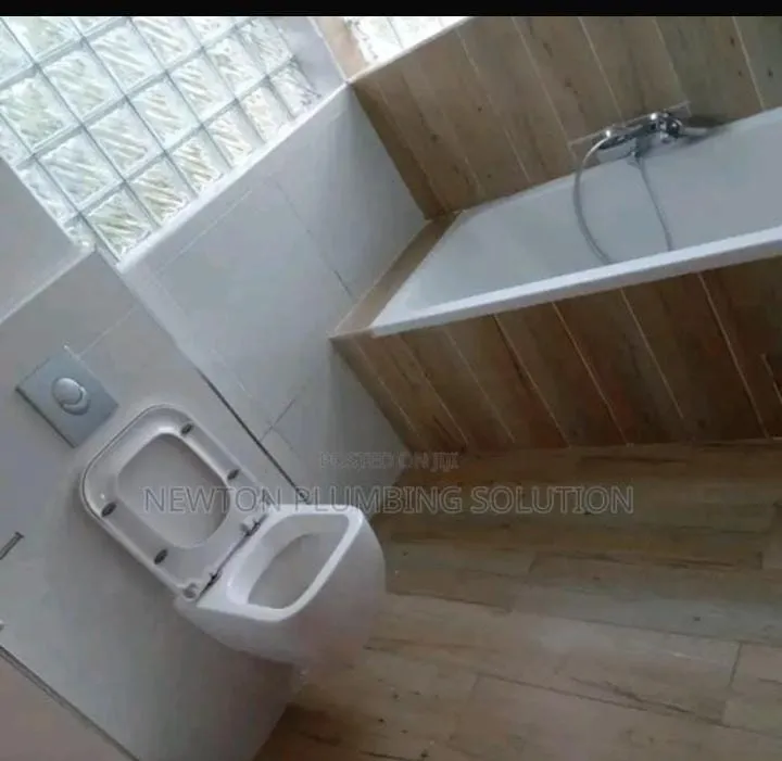 Bathtub plumbing work, photo 2 of 3